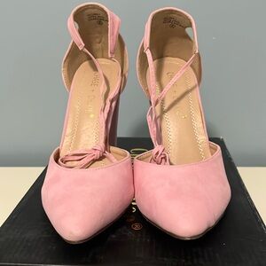 Pink suede pumps